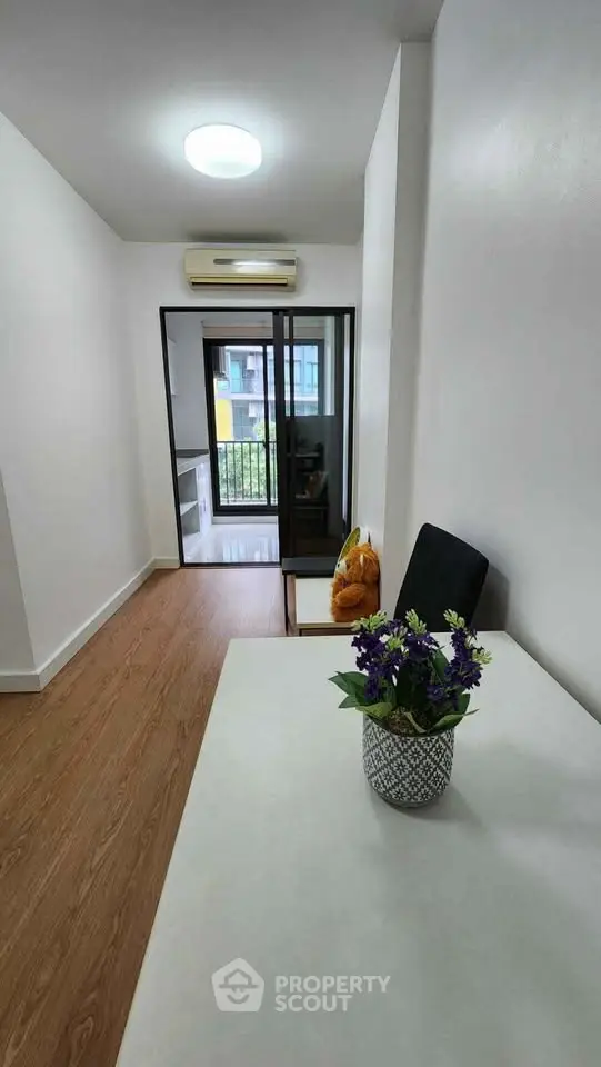 Modern apartment interior with balcony view and stylish decor