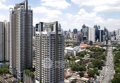 Stunning high-rise buildings with cityscape view in vibrant urban setting.