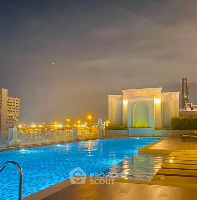 Luxurious rooftop pool with stunning cityscape views at night