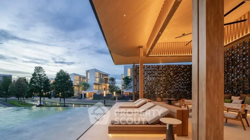 Luxurious modern villa with stunning poolside view and elegant architectural design.