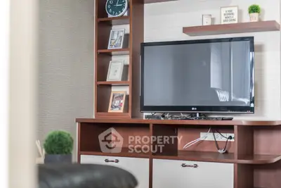 Modern living room with sleek TV unit and stylish decor