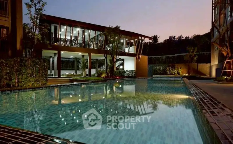 Luxurious residential pool area with modern architecture and serene evening ambiance.