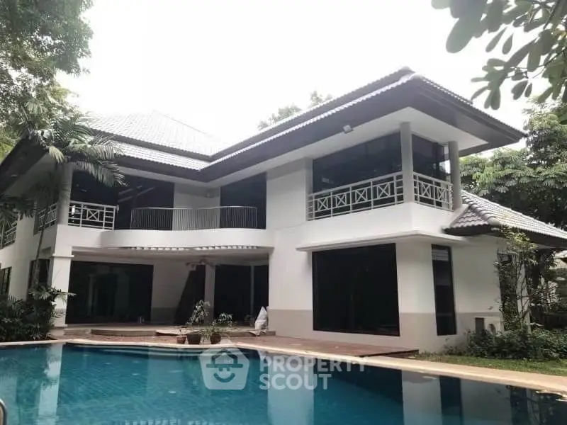 Luxurious modern villa with private pool and lush greenery