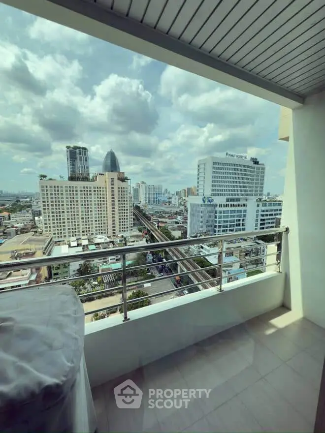 Stunning cityscape view from a high-rise balcony, perfect for urban living enthusiasts.