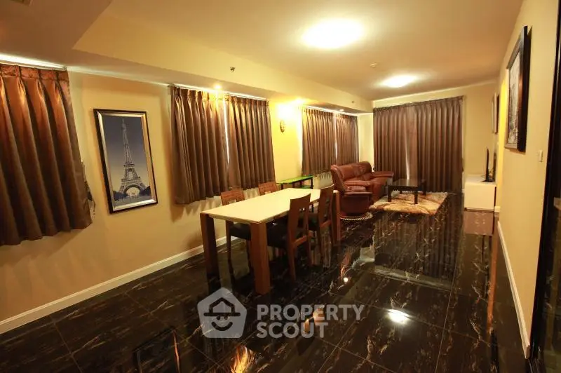 Luxurious living room with elegant decor and glossy flooring