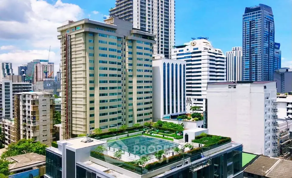Stunning urban high-rise with rooftop pool and lush greenery, offering breathtaking city views.