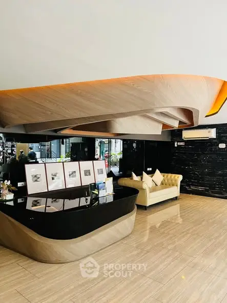Modern lobby with stylish reception desk and elegant seating area