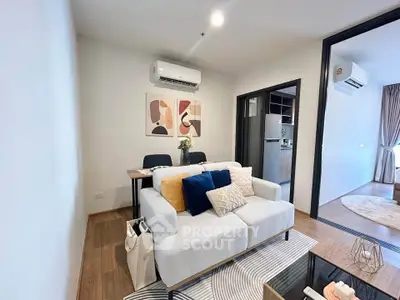 Modern living room with stylish decor and open layout in a contemporary apartment.