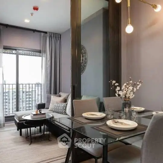 Modern dining area with elegant decor and large windows offering city views.