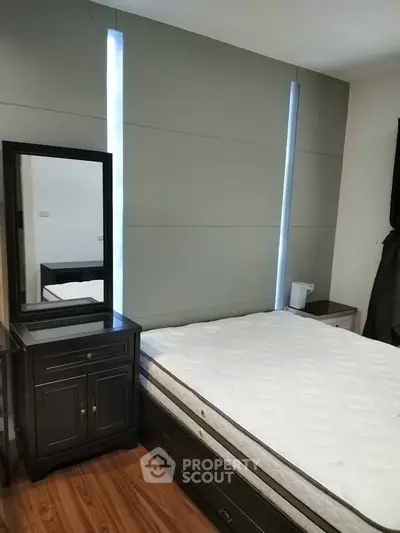 Modern bedroom with sleek furniture and stylish decor