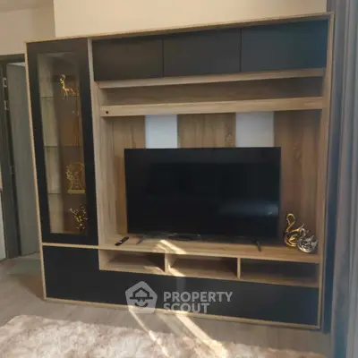 Modern living room with stylish TV unit and elegant decor