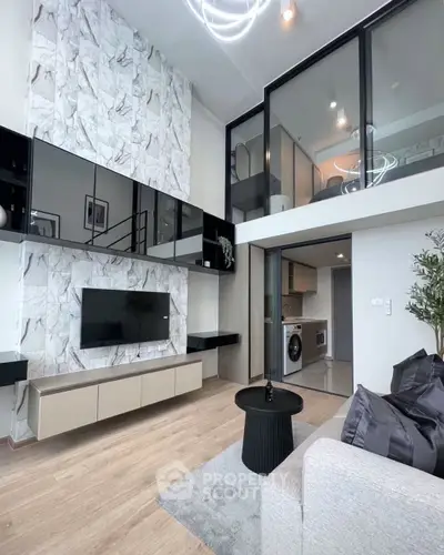 Modern duplex living room with high ceilings and stylish decor