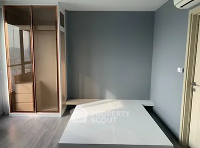 Modern bedroom with built-in wardrobe and minimalist design