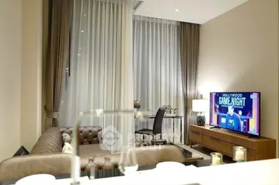 Luxurious living room with elegant decor and modern TV setup