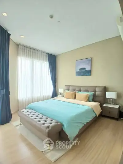 Luxurious bedroom with elegant decor and natural light