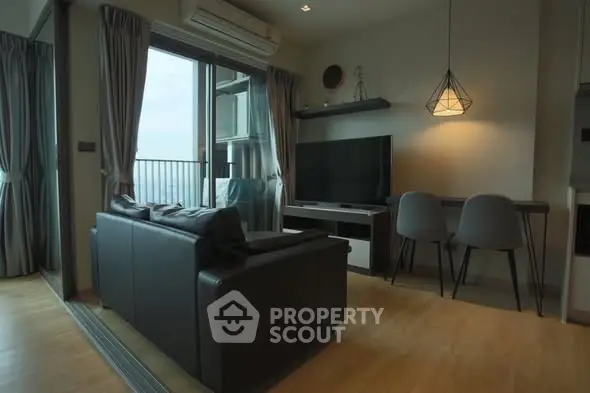 Modern living room with balcony view and stylish decor