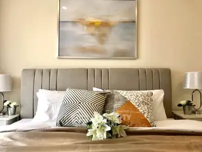 Elegant bedroom with stylish decor and plush bedding, perfect for relaxation and comfort.