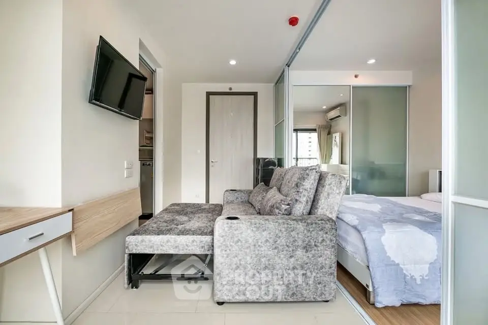 Modern studio apartment with stylish decor and cozy furnishings