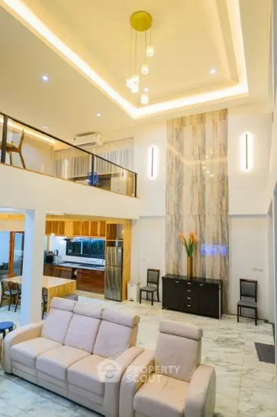 Luxurious modern living room with high ceilings and elegant lighting