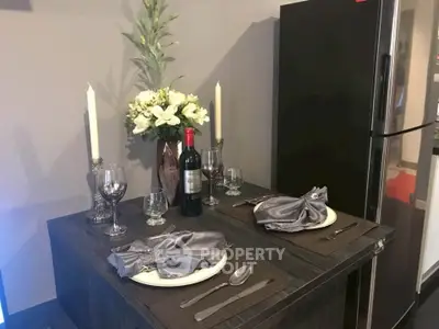 Elegant dining setup with wine and flowers in a modern kitchen