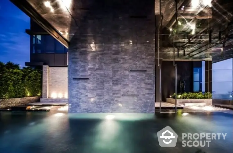 Luxurious modern pool with ambient lighting and sleek architectural design