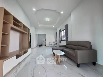 Spacious modern living room with elegant furniture and natural light