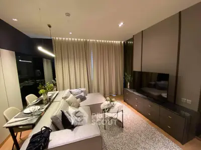 Modern living room with elegant decor and cozy seating area