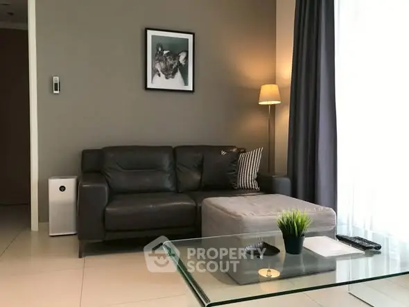 Modern living room with leather sofa and stylish decor