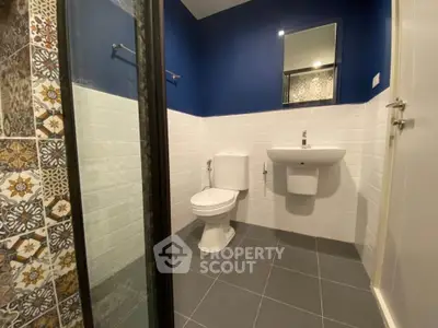 Modern bathroom with stylish tiles and sleek fixtures