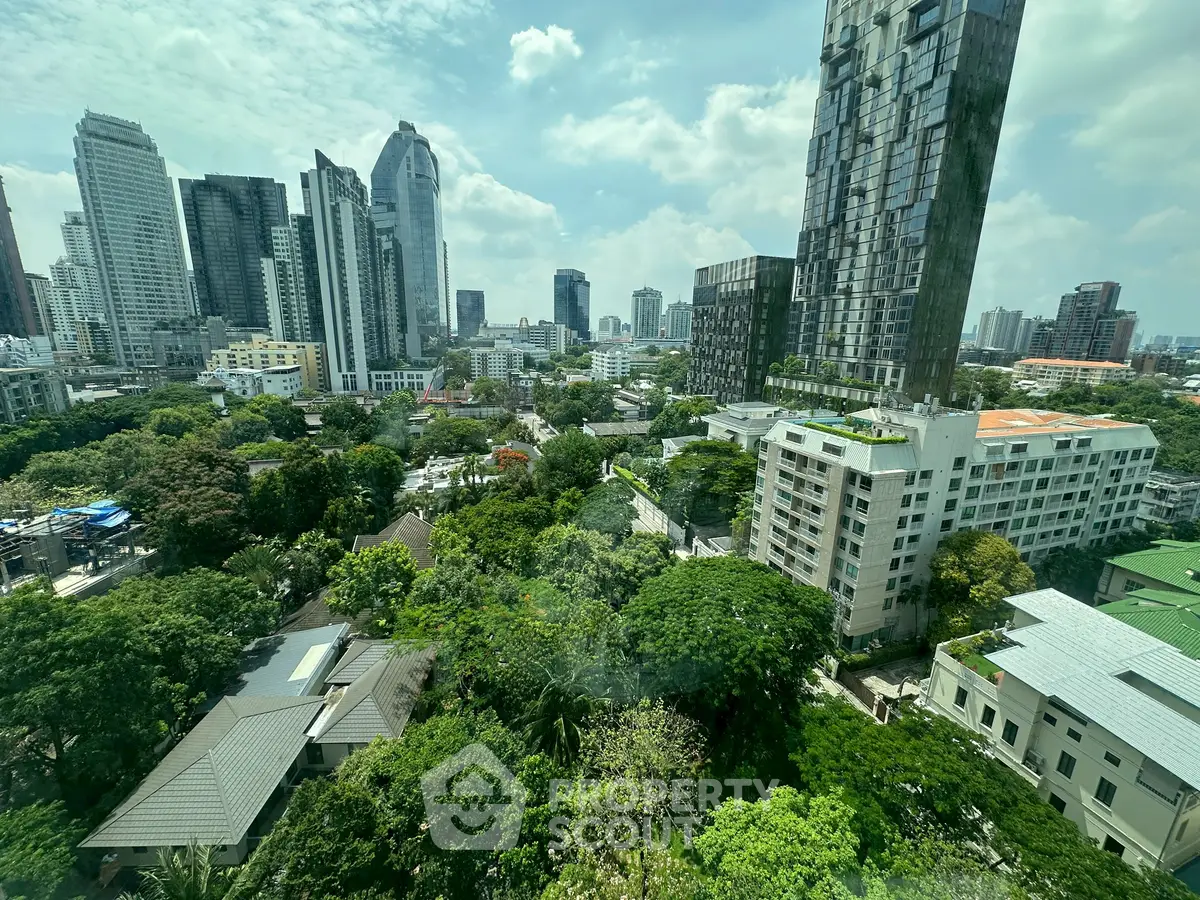 Stunning cityscape view with modern skyscrapers and lush greenery, perfect for urban living enthusiasts.