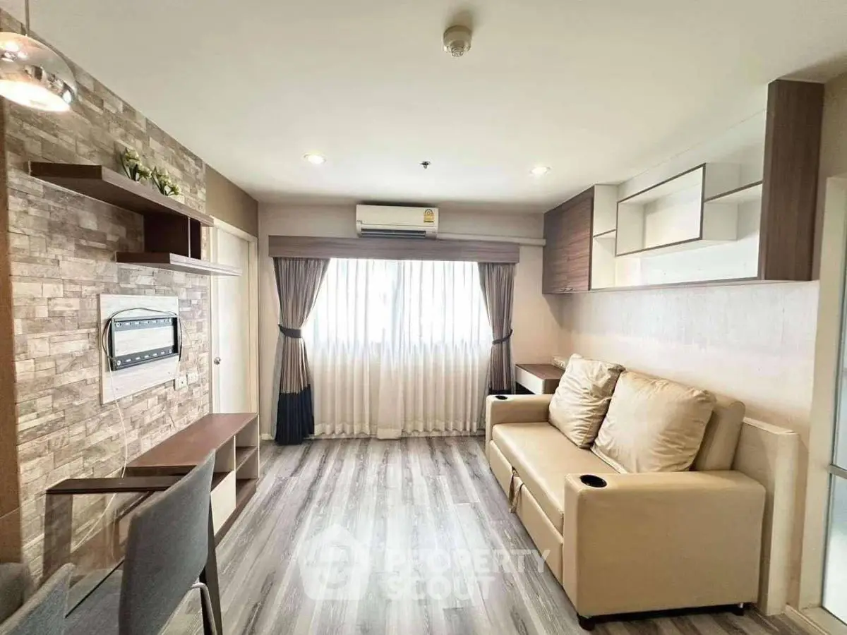 Modern living room with stylish decor and ample natural light