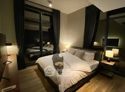Luxurious modern bedroom with large windows and elegant decor