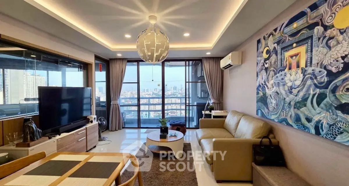 Modern living room with city view, stylish decor, and spacious layout in high-rise apartment.