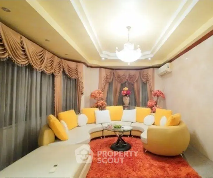 Luxurious living room with elegant decor and plush seating