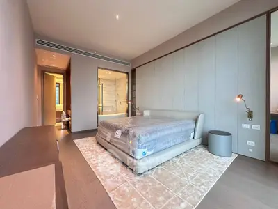 Luxurious modern bedroom with elegant furnishings and ambient lighting