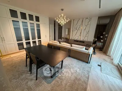 Luxurious living room with elegant chandelier and modern furniture