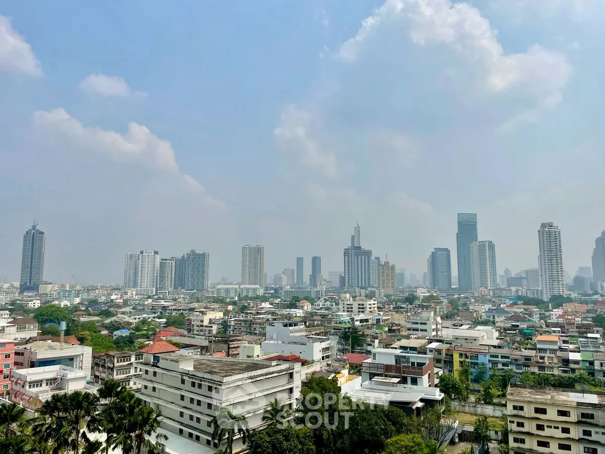 Stunning cityscape view showcasing a vibrant urban skyline with diverse architecture and lush greenery.