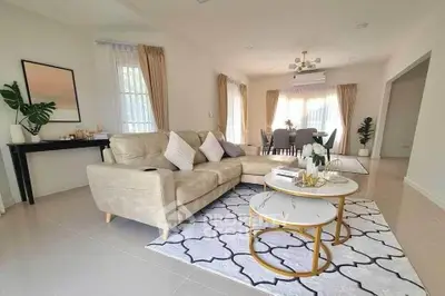 Spacious living room with elegant decor and natural light