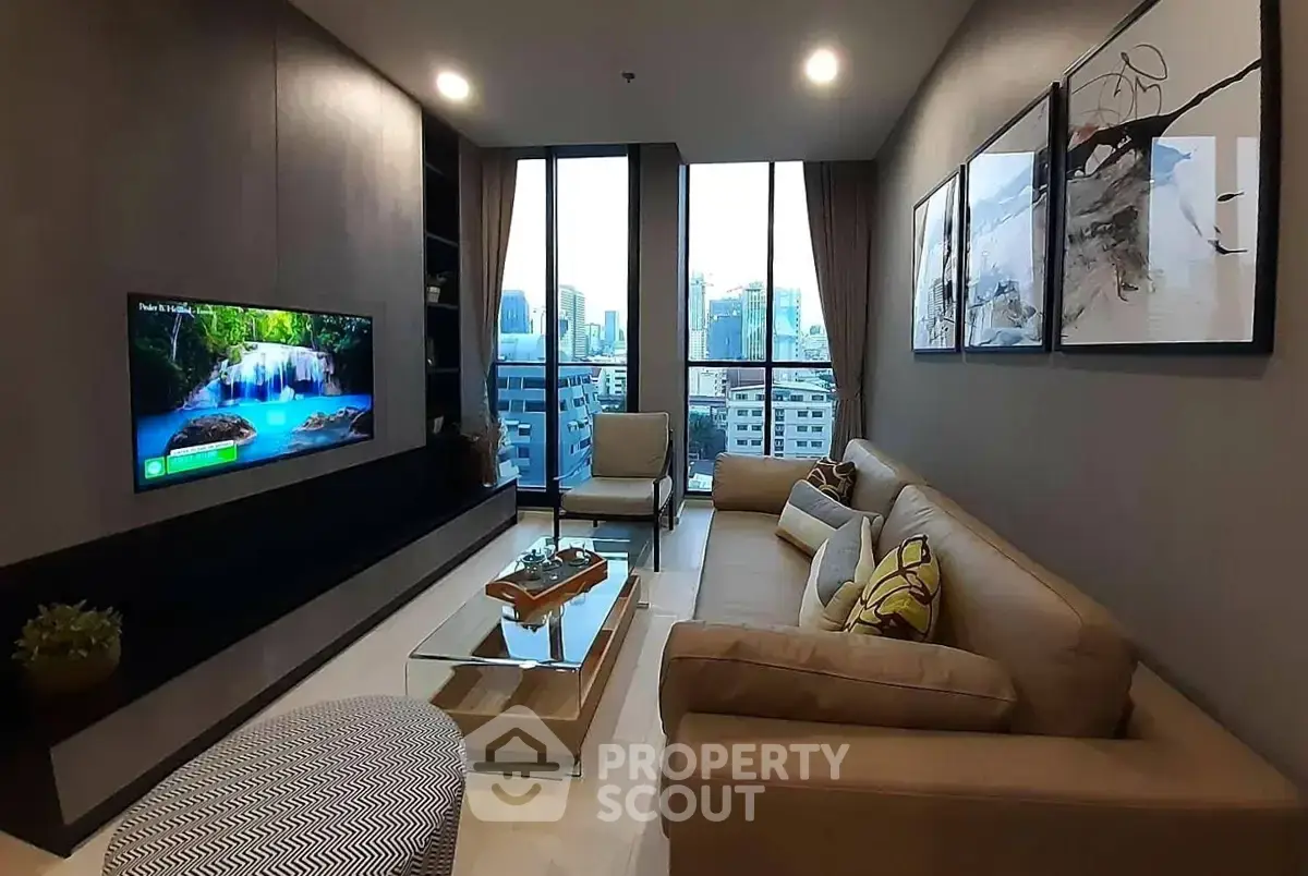 Modern living room with city view, stylish decor, and comfortable seating.