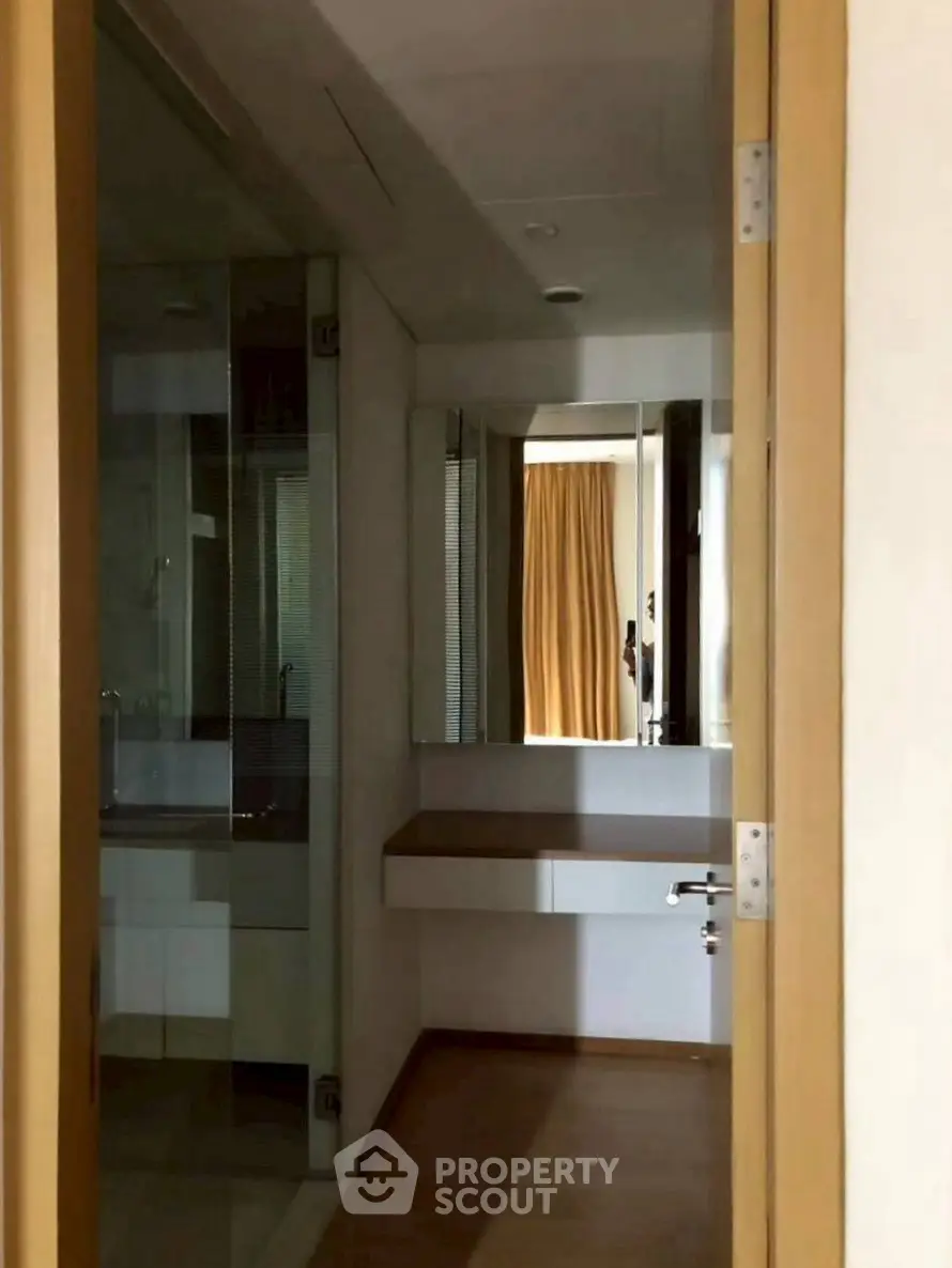 Cozy bathroom with modern fixtures and wooden accents