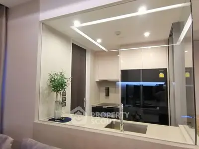 Modern kitchen with sleek design and built-in appliances in luxury apartment