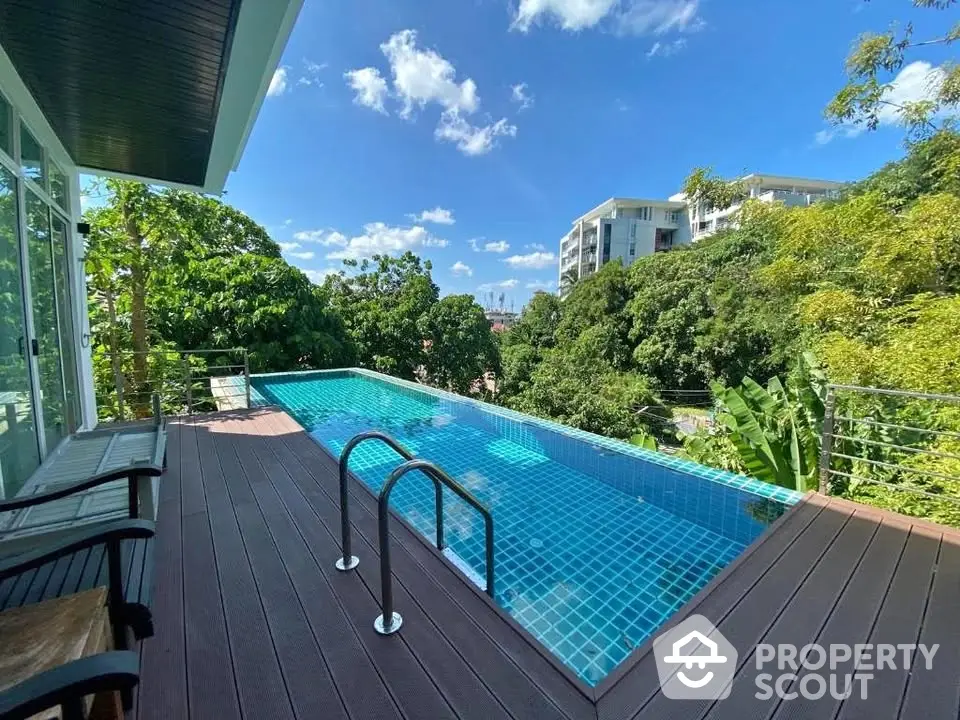 Luxurious infinity pool with stunning view in modern residential area