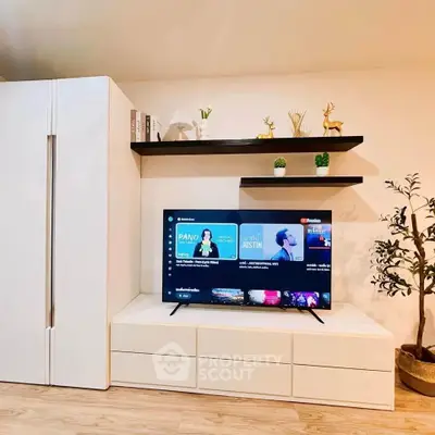Modern living room with sleek TV setup and stylish decor