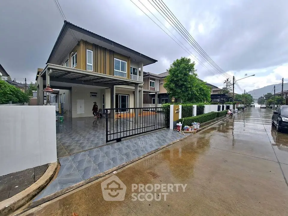 Modern two-story house with spacious driveway and sleek exterior design