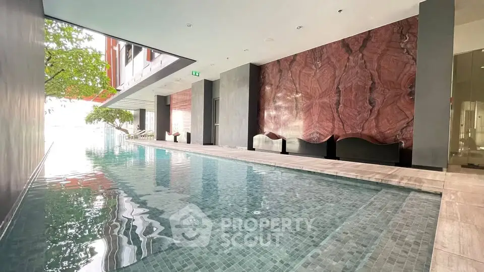 Luxurious indoor pool with elegant design and modern architecture, perfect for relaxation and leisure.