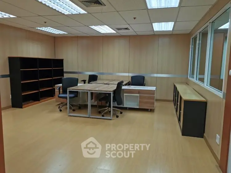 Spacious office interior with modern furniture and ample natural light