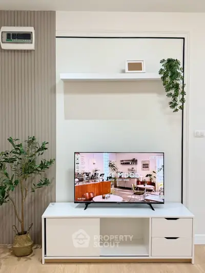Modern living room with sleek TV stand and stylish decor