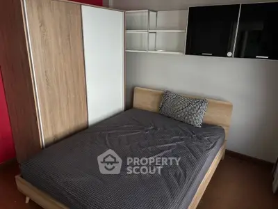 Cozy bedroom with modern wardrobe and stylish decor