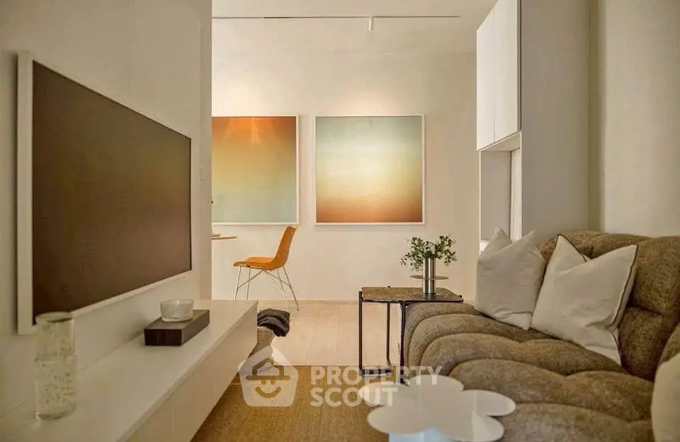 Stylish modern living room with cozy seating and contemporary art decor