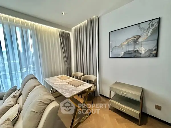 Modern living room with elegant dining area and stylish decor